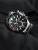 A close-up shot of a Casio Edifice watch resting on a black fabric surface. Voir les images du produit