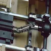 Close-up view of a metal drive shaft assembly for an RC military truck. Náhled obrázku produktu