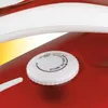 Close-up of a red iron with a white temperature control dial. Produktbild-Vorschau