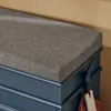 A close-up view of a blue shoe cabinet with a gray upholstered seat cushion. Náhľad obrázku produktu