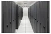 A long aisle in a data center with rows of server racks on either side. Produktbild-Vorschau