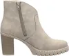 A side view of a beige heeled boot. Produktbild-Vorschau