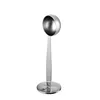 A studio shot of a silver coffee scoop on a white background. Voir les images du produit