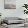 A modern living room setting with a grey dog sofa, a plant, and a painting on the wall. Anteprima dell’immagine prodotto