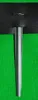 A metal ground anchor is shown inserted into a black fabric material, with a green background. Produktbild-Vorschau