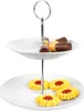 A two-tiered serving stand with cookies and chocolate-covered pastries. Anteprima dell’immagine prodotto