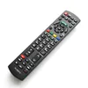 A black remote control is shown against a white background. Voir les images du produit