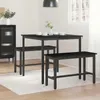 A dining set with a table and two benches in a room. Voir les images du produit