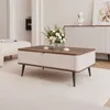 A modern living room setting with a coffee table as the main focus. Voir les images du produit