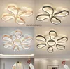 A collage of four images showing modern ceiling lights in different color variations and arrangements. Podgląd zdjęcia produktu