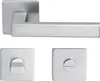 A set of door handles and related hardware, made of brushed metal, displayed against a white background. Produktbild-Vorschau