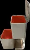 A side view of a white and orange recycling bin unit. Podgląd zdjęcia produktu