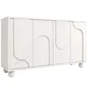 A white sideboard cabinet with four doors and decorative arched panels. Produktbild-Vorschau