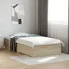 A bedroom scene with a bed, a nightstand, and a painting on the wall. Podgląd zdjęcia produktu