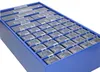 A blue storage box with multiple transparent compartments for small items. Produktbild-Vorschau