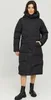 A woman wearing a black puffer coat and boots, standing against a white background. Produktbild-Vorschau