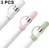 Three Apple Pencil accessories in white, pink, and green are shown diagonally against a white background. Produktbild-Vorschau