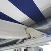 A close-up view of the mechanism and fabric of an awning. Produktbild-Vorschau