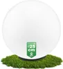 A white sphere light fixture resting on a patch of artificial grass. Podgląd zdjęcia produktu