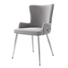 A single gray velvet dining chair with silver metal legs is shown against a white background. Podgląd zdjęcia produktu