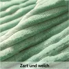 A close-up view of a soft, textured fabric with prominent ribbed lines, likely a pet bed or blanket. Produktbild-Vorschau