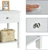 Collage of images showing a white nightstand with a drawer and shelf, a close-up of the drawer handle, and a hand wiping a surface. Podgląd zdjęcia produktu