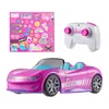 A Barbie RC car, a remote control, and a sheet of stickers are displayed against a white background. Náhľad obrázku produktu