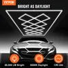 A car is shown under a grid of bright lights, with icons and text describing the lights' features. Podgląd zdjęcia produktu