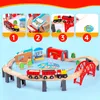 A collage of images showing a wooden train set with various accessories and a detailed view of the assembled set. Produktbild-Vorschau