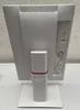 The back of a white Fujitsu monitor on a white stand, placed on a white surface. Produktbild-Vorschau