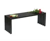 A black metal bench with a book and roses on it, set against a white background. Produktbild-Vorschau