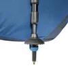 A close-up view of a trekking pole attached to a blue backpack. Produktbild-Vorschau