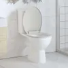 A white toilet with the lid up, set against a tiled wall. Produktbild-Vorschau