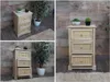 A collage of three images showing a wooden chest of drawers with rattan fronts, decorated with small potted plants and a large potted plant. Podgląd zdjęcia produktu
