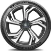 A close-up shot of a car tire and rim. Podgląd zdjęcia produktu
