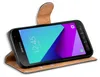A Samsung Galaxy XCover 4/4S smartphone in a brown flip case, displayed at an angle. Anteprima dell’immagine prodotto