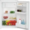 An open refrigerator filled with food items. Voir les images du produit