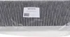 A close-up of a carbon filter for an appliance, with a label attached. Anteprima dell’immagine prodotto