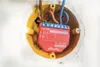 A close-up view of a Shelly Plus 1PM smart home device installed inside a wall electrical box. Produktbild-Vorschau