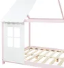 A close-up view of a pink and white children's bed frame with a house-shaped roof and a window detail. The bed frame has wooden slats for the mattress support. Produktbild-Vorschau