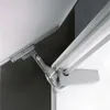 A close-up view of a mechanical lift assist mechanism, likely for a cabinet or furniture, showing its metal components and how it attaches to surfaces. Produktbild-Vorschau