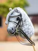 A close-up of a hobby horse's head with a bridle. Náhľad obrázku produktu