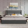 A bedroom scene featuring a bed with pillows and a painting above it. Produktbild-Vorschau