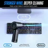 A black electric duster is shown cleaning a dirty RGB keyboard. Podgląd zdjęcia produktu