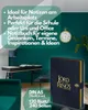 A dark blue notebook with gold lettering is displayed on a desk in a room with teal walls. Text overlays describe the notebook's features and specifications. Náhled obrázku produktu