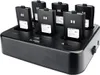 A black multi-way charger with six radio batteries inserted. Produktbild-Vorschau