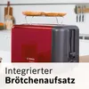A red and grey Bosch toaster with two slices of bread on a warming rack, set in a kitchen environment. Voir les images du produit