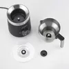 A disassembled milk frother with its components laid out on a white background. Produktbild-Vorschau