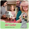 A collage of images showing people giving and receiving gifts, and a decorative elephant statue with gnomes and a lantern. Produktbild-Vorschau