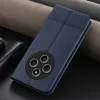 A blue leather phone case with a circular camera cutout is shown on a textured background. Produktbild-Vorschau